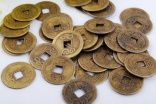 古代的铜钱是谁发明的？为何是外圆内方的造型呢？